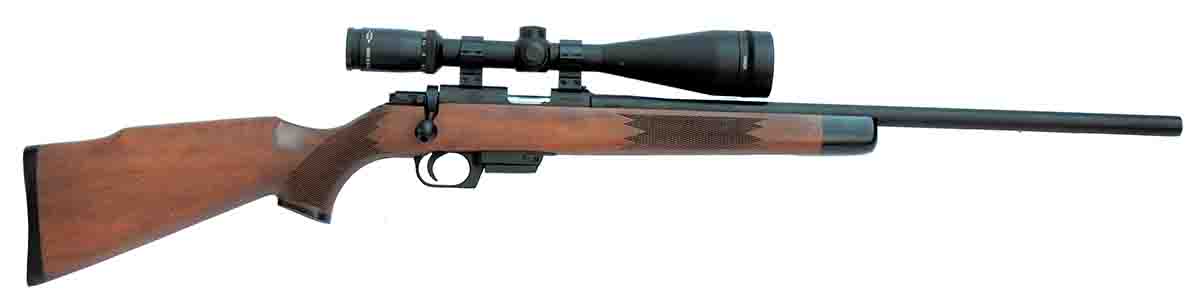 The Rock Island Armory M22 TCM rifle was originally in .22 Winchester Magnum Rimfire (WMR) and converted to feed the centerfire .22 TCM cartridge. It weighs 7 pounds without a scope and has a medium-heavy, 221⁄4-inch barrel with a 1:16 rifling twist rate. A two-digit serial number indicates this rifle was likely built in 2015.